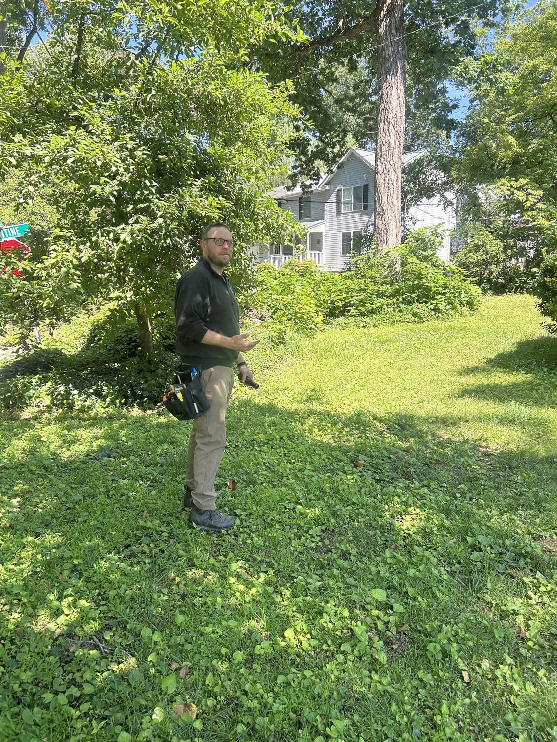 Matt evaluating a home and its surrounding grounds